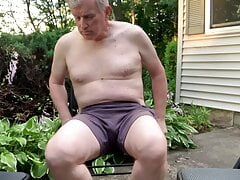 Masturbating spread open wide and naked outside