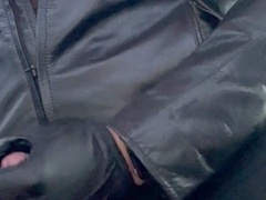 Bearded hunk in a leather jacket pleasures himself with his leather glove