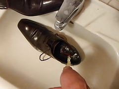 Piss in men's dress shoe