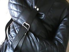 Leather bikersuit and leather straitjacket