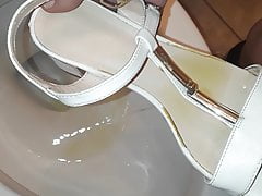 pissed her white sandals