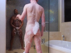 Muscular black man and a petite pale lad in a hot video