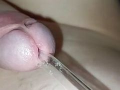 young inserts a tube into the urethra of a small dick