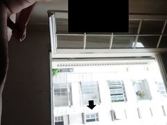 Neighbor caught me naked with hard dick at window and stay shocked