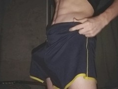 Horny twink moans while giving an amateur oily handjob