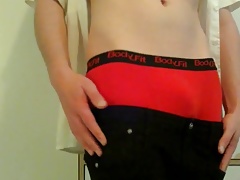 sagging black slim jeans in red boxerbriefs
