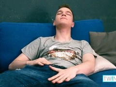 Slender dark-haired twink gets off while playing with a sex toy