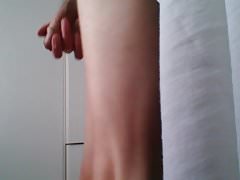 Masturbating