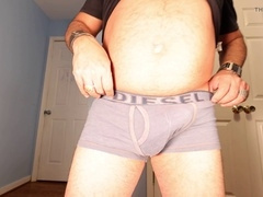 Hot daddy enjoys solo pleasure in seductive underwear with an up-close view of his impressive package and juicy pleasure