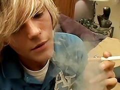 Dillon and Kyros smoke in bedroom and suck and fuck bareback