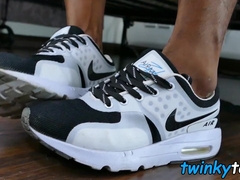 Cute little Asian twink enjoys toying with his cock and feet