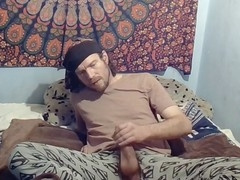 Teasing in open crotch pants on camera