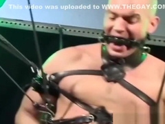 Hairy man with muscles moans as he is tormented and tied up