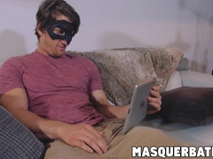 Good looking twink watches porn on tablet while jerking off