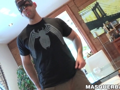 Hunky muscular and masked guy Nathan Topps solo masturbates