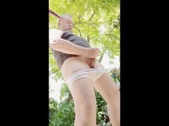 Hot blonde guy enjoying a solo wank in the garden
