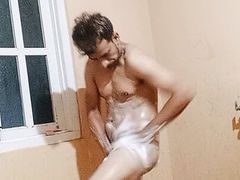 Boy bathing hot tube