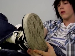 Young emo Tyler Bolt jacks off his cock and licks his toes