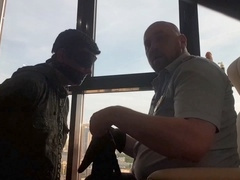 Dominant Russian cop asserts control over military boy using leather gloves, harsh slaps, and spitting