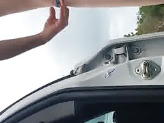 red bikini in beach parking lot