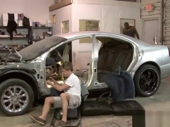 Car mechanic sucking huge black dick