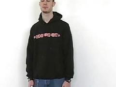 Tied up cutie has his bare feet tickled