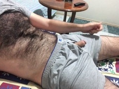 Preparing to stroke myself by playing with my hairy body