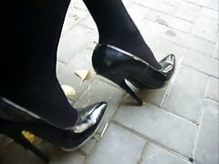 Strolling down the street in my black patent leather high-heeled stilettos