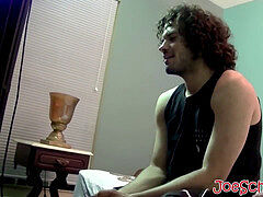 stunning man with curly dark-hued hair jerking off his big cock