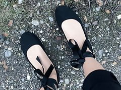 Crossdresser posing outdoor at highway in leggings