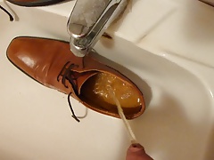 Piss in men's dress shoe