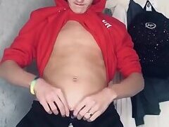 Cheeky gay twink from Australia in hoodies jerks his dick off and cums