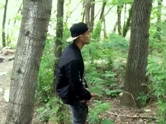 Bad guy strokes while smoking ciggy in a woods - nearly caught - so his scrotum linger utter