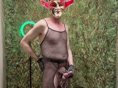 Masturbating alone in fishnet stockings and cock ring