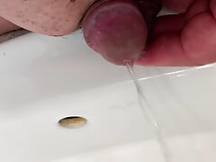 Small penis takes a pee