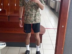 boy uses gym toilet after workout