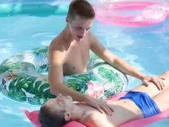 Young stud Corey Law takes it raw from hung hunk Tony Milak at the pool