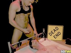 Muscular man tears apart guy's asshole with an intense automatic fucking machine hardcore