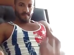 He wanks his big cock