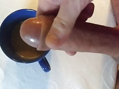 dad puts milk in his coffee