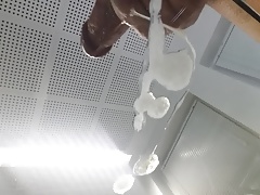 Cum on glass table