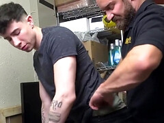 Tattooed fellow gets his cock sucked by the security guard