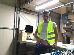 Handsome worker takes a break in storage room to masturbate