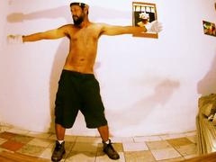 Furry naked man with hairy gay beard dances seductively