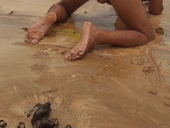 Ladysilva bare on beach