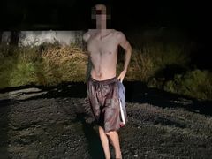 Man Strips and Walks down Public Road at Night