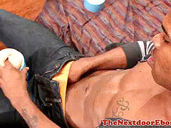 Dark-hued jock stroking his massive rod