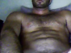 Sexy bearded cub stroking