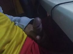 In front of the computer