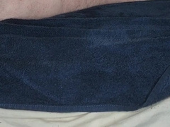 Chub laying down toying with fake penises